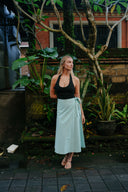 Wildalaya Everyday Hemp Wrap Skirt in natural sand, front view, relaxed wrap silhouette