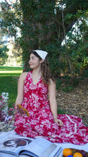 Petal Song Halter Dress - Model Sitting in Kings Park Perth